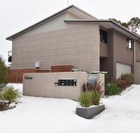 Khione 1 - Modern  spacious with views towards Lake Jindabyne  the mountains beyond - Accommodation 4U