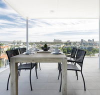 Minimalist Penthouse Condo with Skyline Vistas - Accommodation 4U