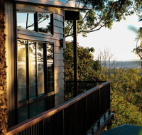 Rainforest Gardens - Luxury Hillside Chalets with Views to Bay  Islands - Accommodation 4U