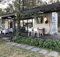 Absolute riverfront shipping container cabin - Accommodation 4U